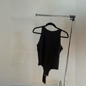 Women’s black bodysuit